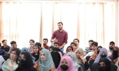 answering quries of Neuro-Linguistic Programming Seminar at Abasyn University Islamabad